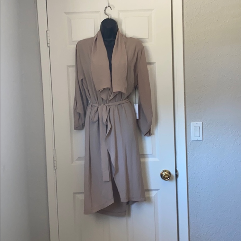 Brand new cute light cover up jacket